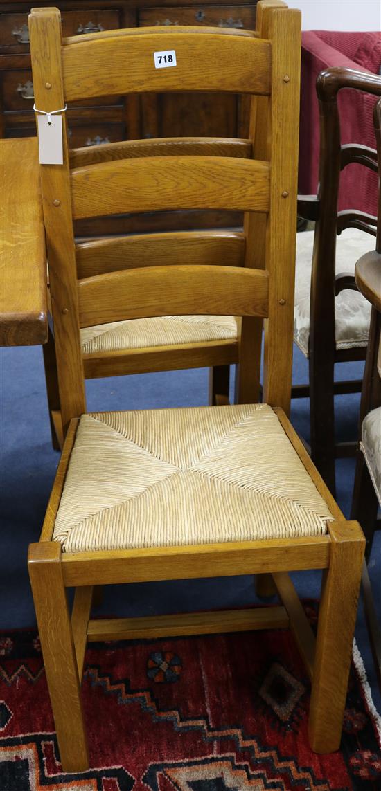 A set of ten oak rush seat chairs